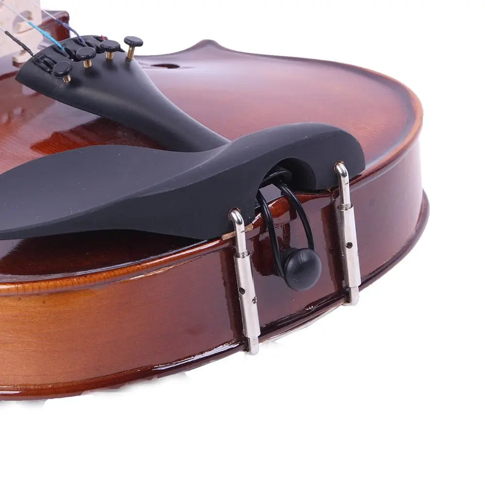 Close-up of a violin with a chin rest on a white background